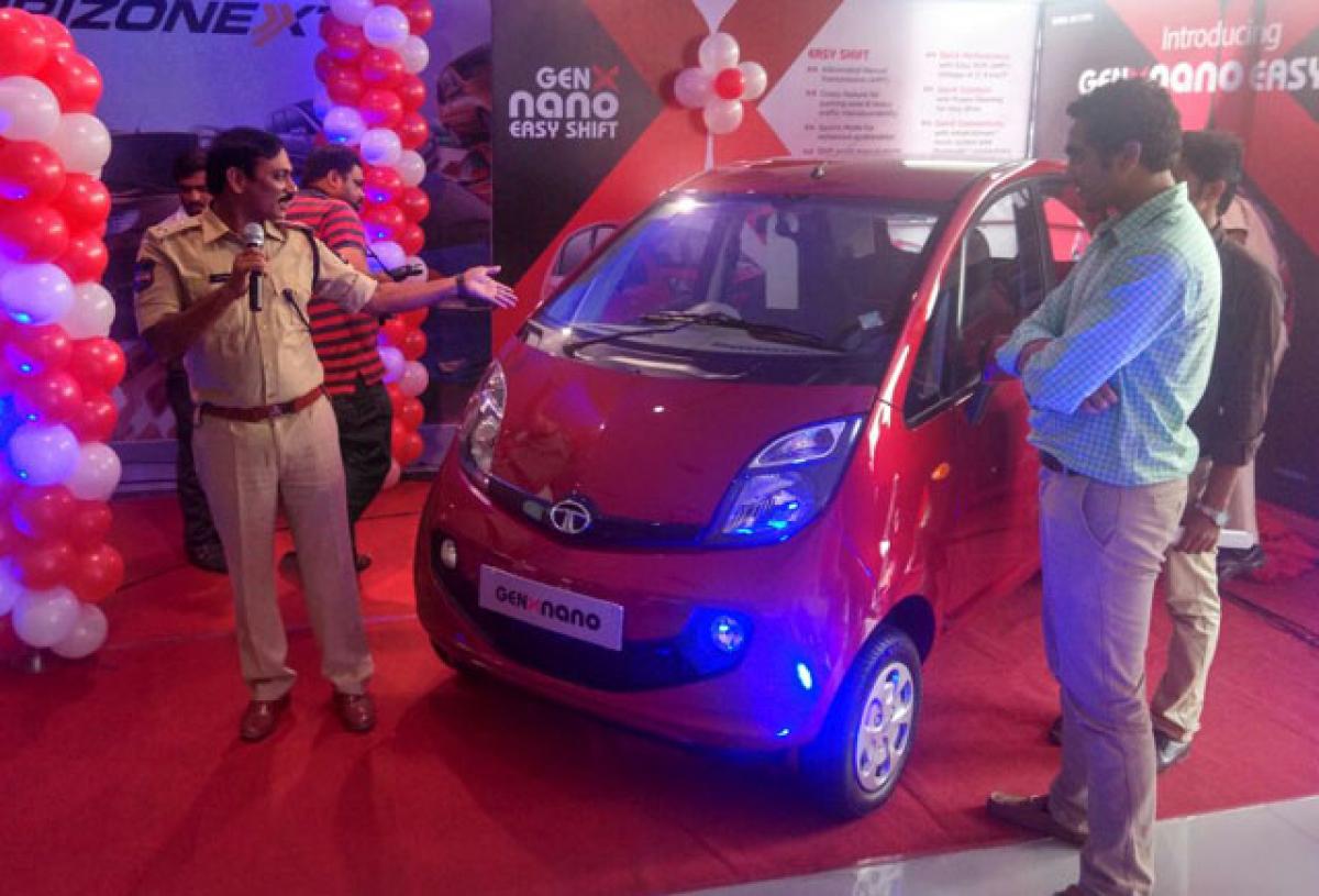 Satyanarayana, DCP, South zone, Hyderabad, speaking at the function to hand over first lot of Tata GenX Nano cars at  Tejaswi Motors, in Hyderabad 